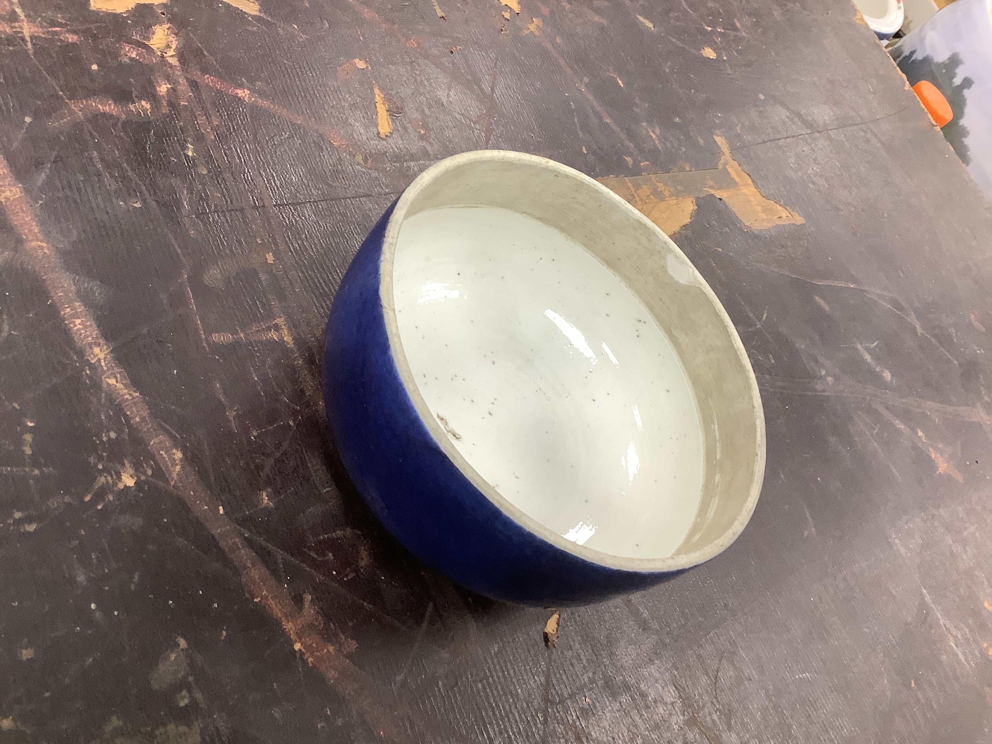 A large Chinese powder blue jar and cover, Kangxi period, cracked and a section glued